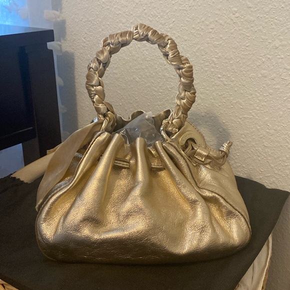 kate spade Handbags - KATE SPADE GOLD HANDBAG
